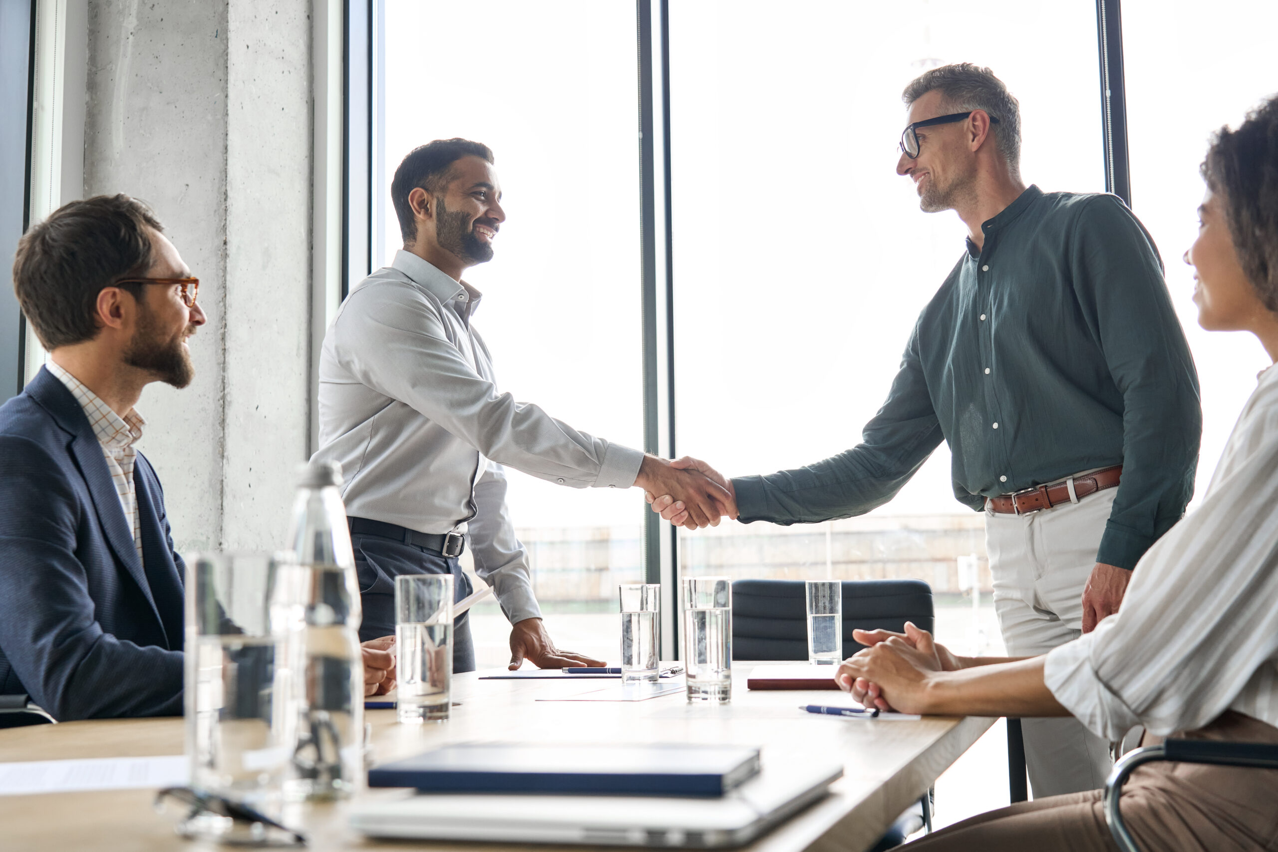 Two,Happy,Diverse,Professional,Business,Men,Executive,Leaders,Shaking,Hands