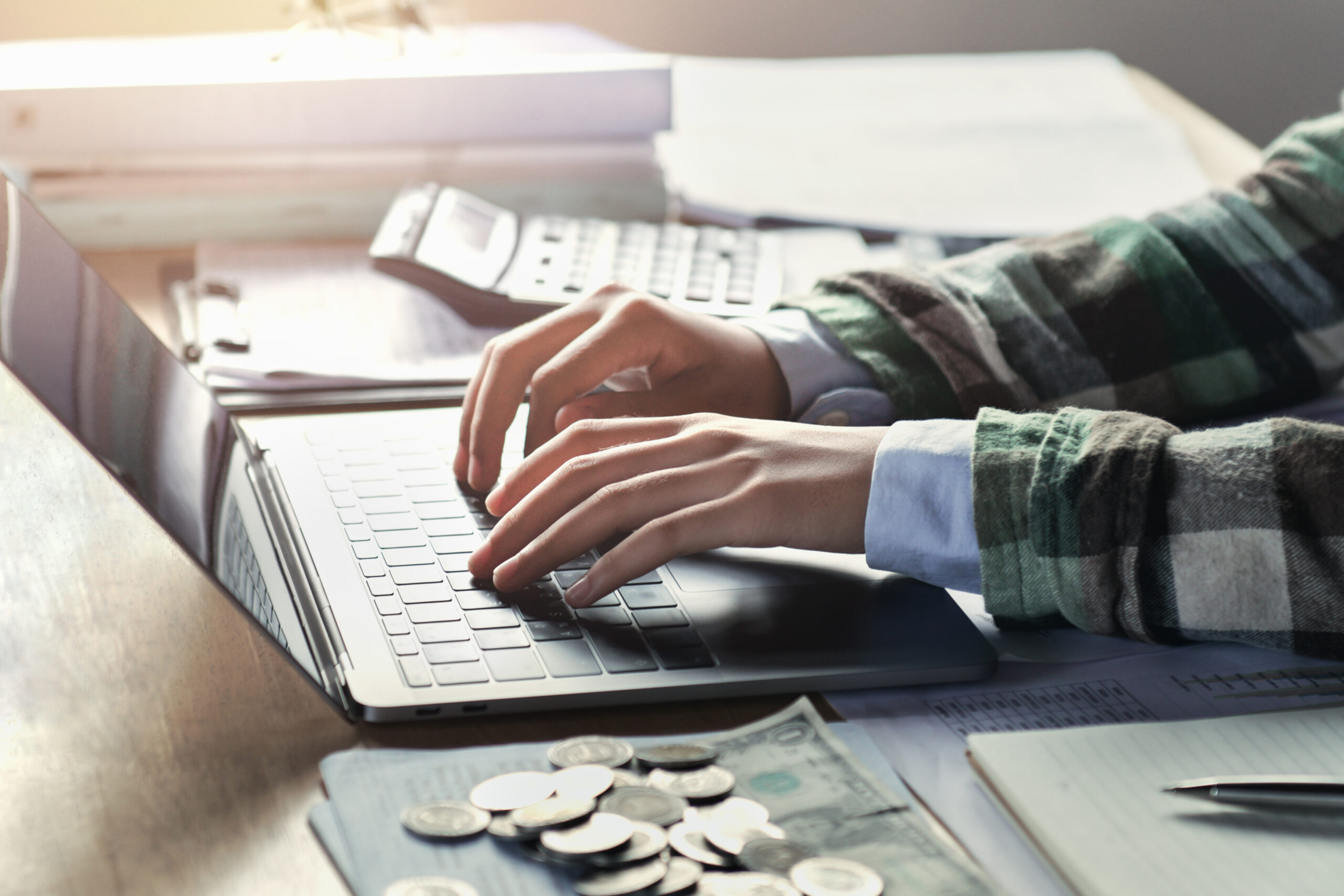 businesswoman working on desk with using laptop. concept finance